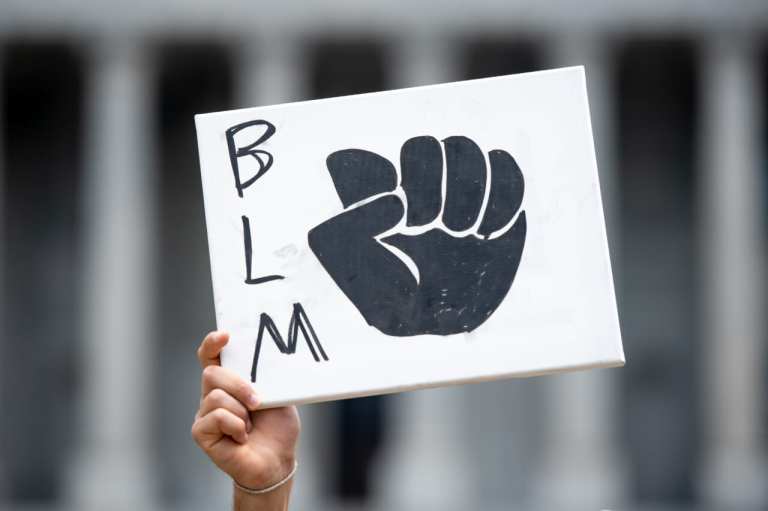 Black Lives Matter sign, theGrio.com