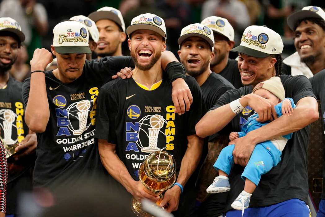 Stephen Curry and teammates, theGrio.com