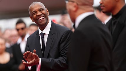 Denzel Washington receives surprise honorary Palme d’Or at Cannes premiere for ‘Highest 2 Lowest’