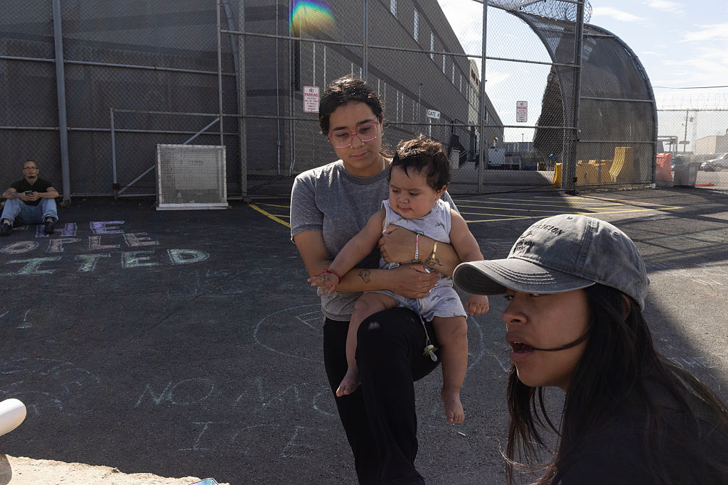 ICE agents and immigration activists face off outside Delaney Hall detention center in Newark, New Jersey
