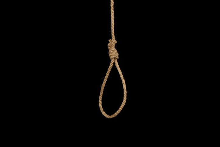 Hanging noose on black background