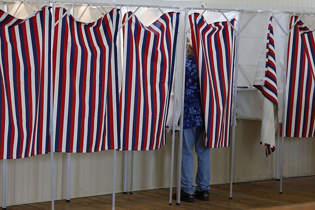 Voters Head To The Polls For New Hampshire's Primary Election For The Midterms