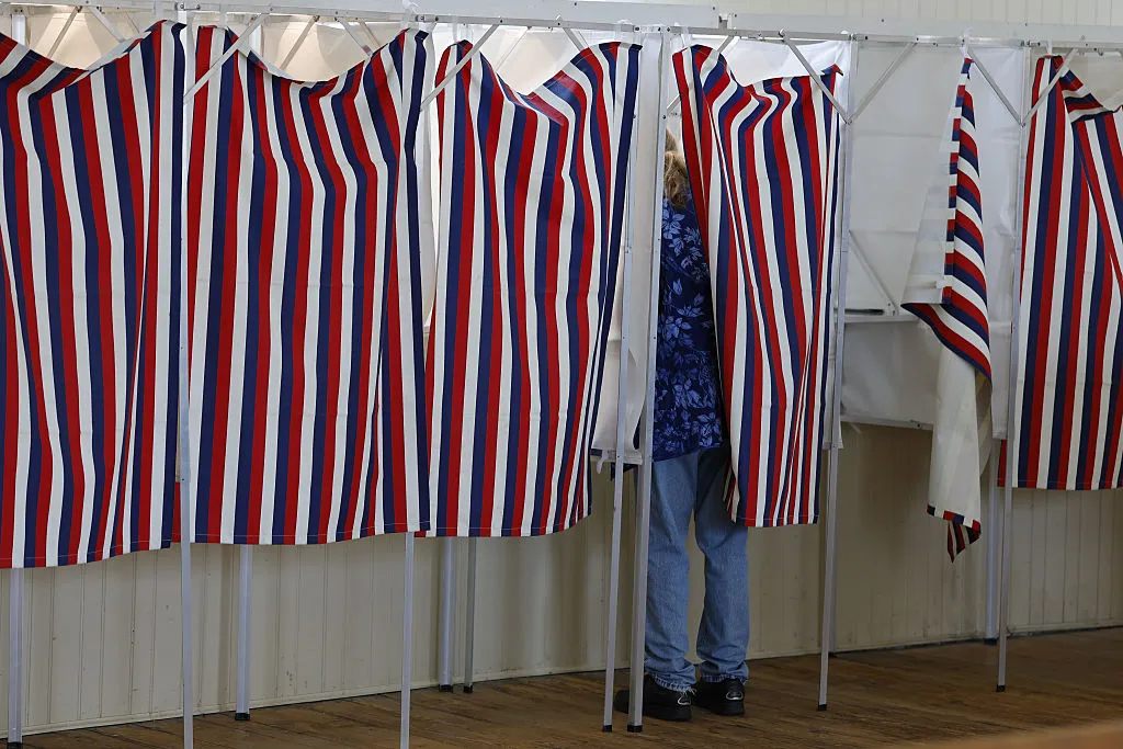 Voters Head To The Polls For New Hampshire's Primary Election For The Midterms