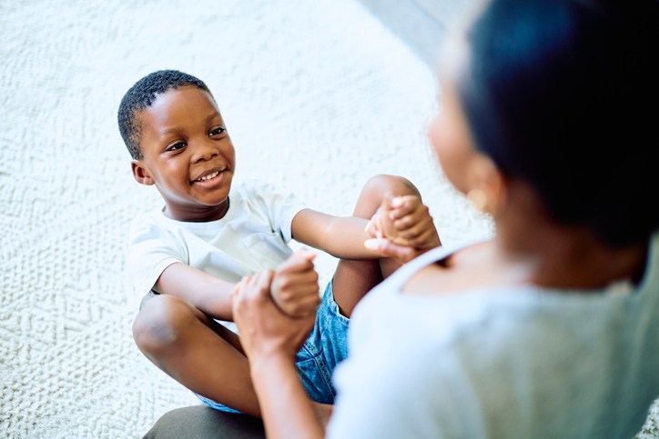 Mother and son playing bonding together at home