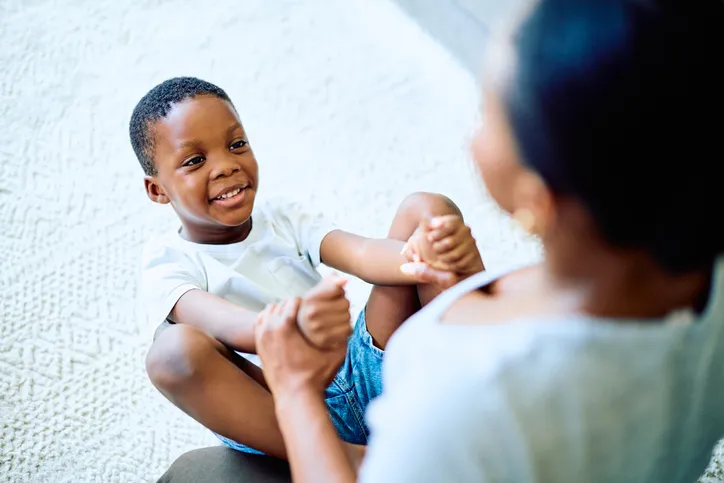 Mother and son playing bonding together at home